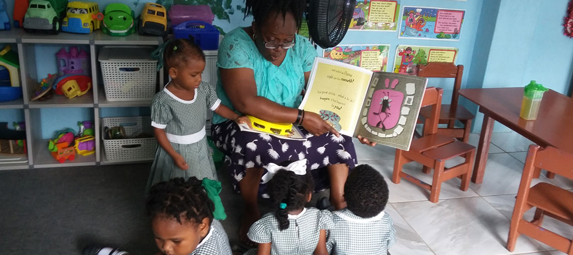 Abiola reading to children
