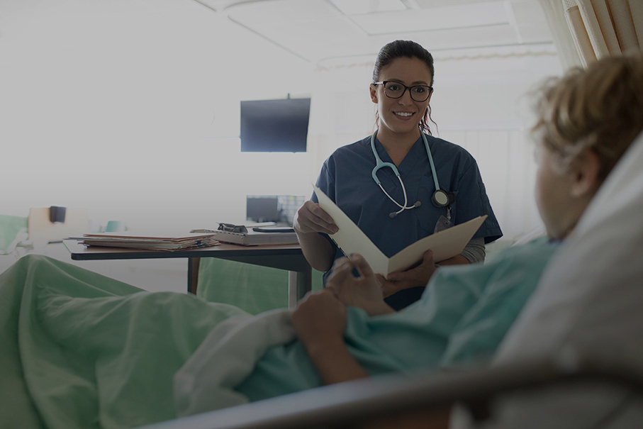 A nursing student helping a patient with a gradient ontop